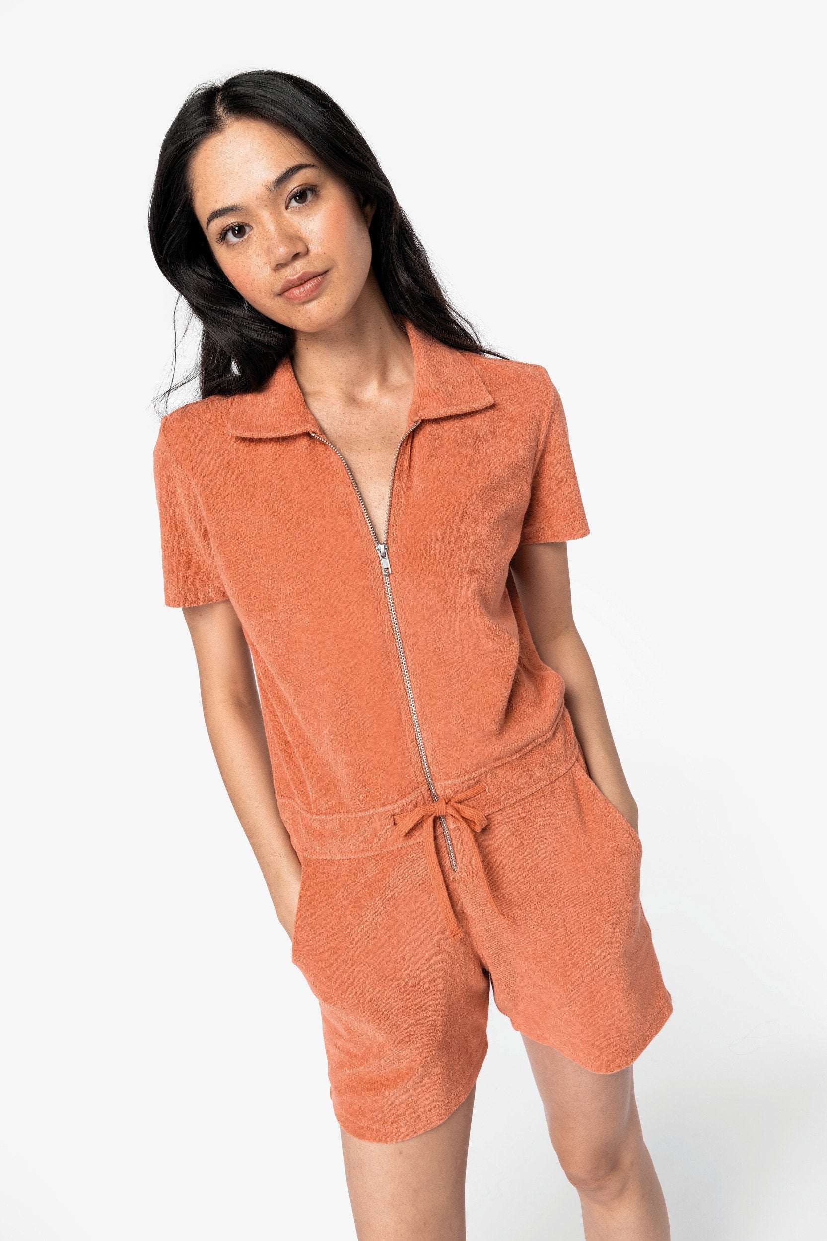 Model wearing the luxury organic cotton zipped jumpsuit, styled for a chic and relaxed look, perfect for sustainable living.