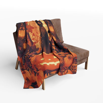 Luxurious Decorative and Warm Halloween Spooky Arctic Fleece Blanket draped over a stylish armchair, featuring festive Halloween designs with pumpkins and lanterns.