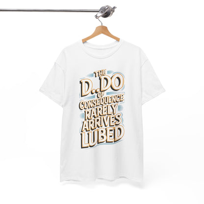 Karma Funny Gift Graphic T-Shirt elegantly displayed on a hanger, emblazoned with the cheeky saying 'The D.O. of Consequence Rarely Arrives Lubed', perfect for casual outings.