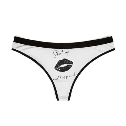 Stylish white thong with black trim, showcasing a cheeky graphic that reads 'Shut Up! and kiss me!', ideal for adding fun to intimate moments.
