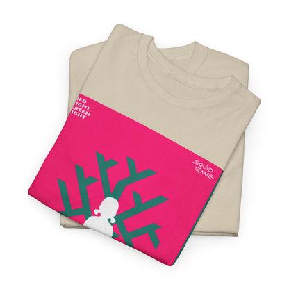 Luxury Squid Game inspired unisex graphic tee, featuring a stylish design in cream with vibrant pink and green elements, beautifully folded.