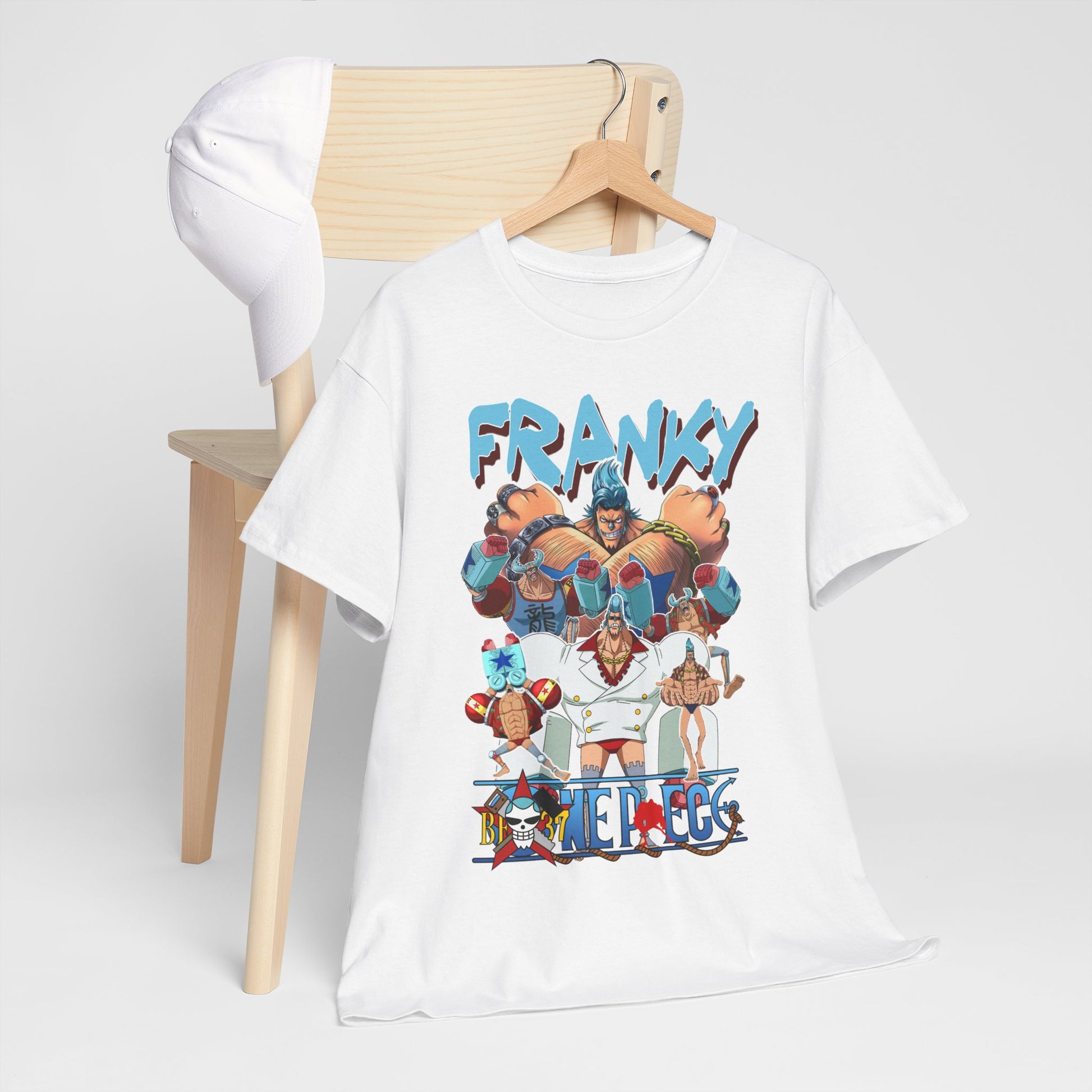 Chic presentation of white t-shirt with ‘Franky’ graphic from ‘One Piece’, paired with a trendy cap, reflecting a fashionable and versatile style for casual outings.