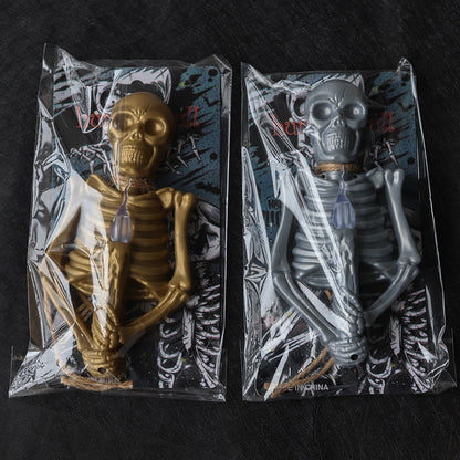 Halloween Decoration Skull Lamp Horror Atmosphere Arrange Hangings with elegantly packaged gold and silver skeleton lamps, ready for display.