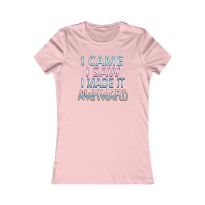 Delicate pink women's t-shirt featuring the unique slogan 'I CAME I SAW I MADE IT AWKWARD' in eye-catching pastel typography, embodying fun and sophistication.
