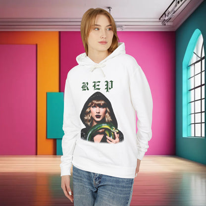 Stylish white unisex cotton hoodie for Swifties, embellished with a vibrant design of a renowned pop artist holding a green snake, perfect for fans.