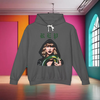 Luxurious unisex cotton hoodie for Swifties featuring a unique design of Taylor Swift with a green snake, available in 8 colours.