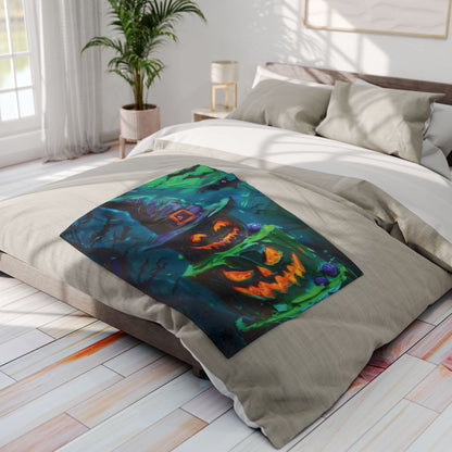 Luxurious Decorative and Warm Halloween Spooky Arctic Fleece Blanket featuring vibrant jack-o'-lanterns and a witch's hat, perfect for a cozy autumnal atmosphere.