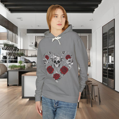 Model wearing a Unisex Lightweight Hooded Sweatshirt featuring a striking skull and roses design, set against a chic modern kitchen backdrop.