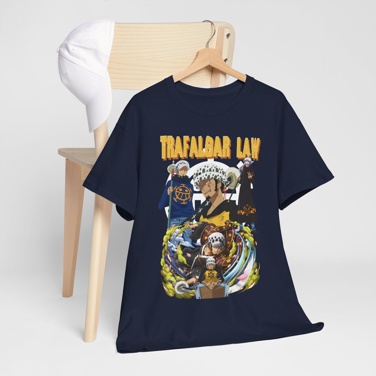 Sophisticated navy T-shirt displayed on a hanger next to a white cap, highlighting the intricate Trafalgar Law design, perfect for a fashionable look.