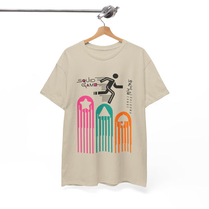 Elegant beige Squid Game graphic t-shirt displayed on a hanger, featuring colourful designs of the iconic game elements.