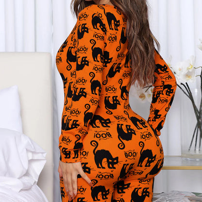 Back view of the Halloween Printed Jumpsuit showcasing a luxurious orange design with black cat motifs, ideal for Halloween celebrations.