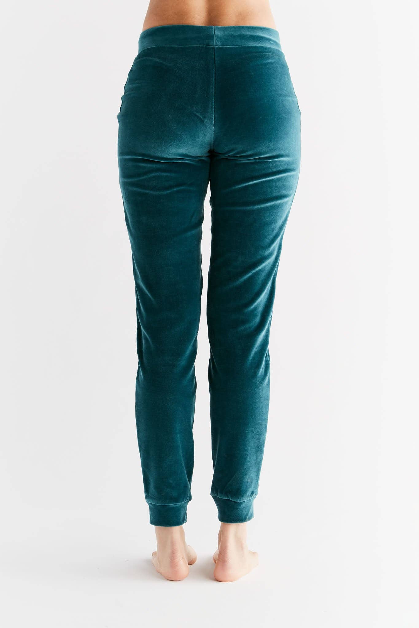 Close-up of sophisticated women's organic cotton sweatpants showcasing the soft fleece texture and luxurious finish.