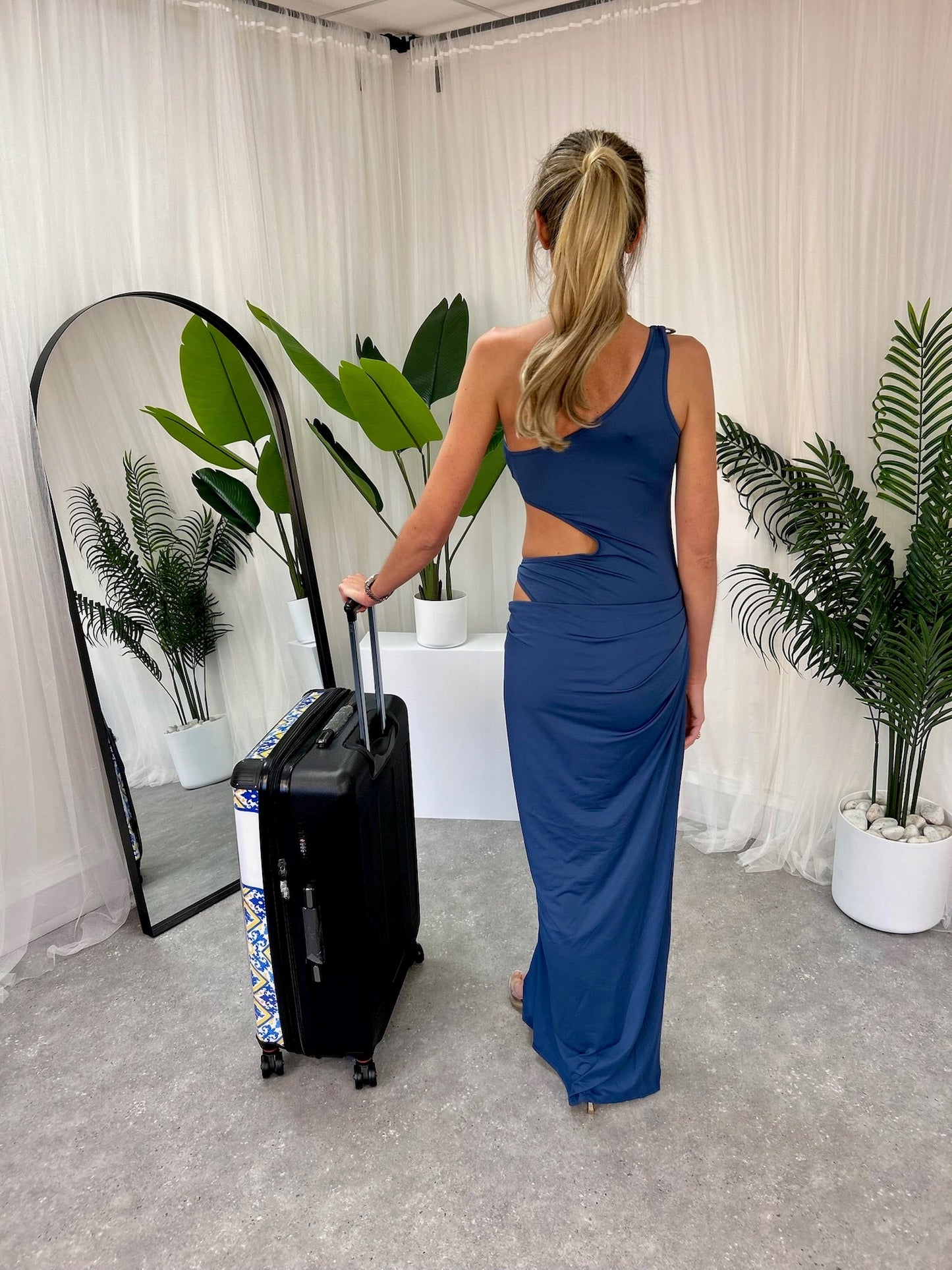 Ariel Maxi Dress in various sizes S to L, ideal for upscale events and fashionable gatherings.