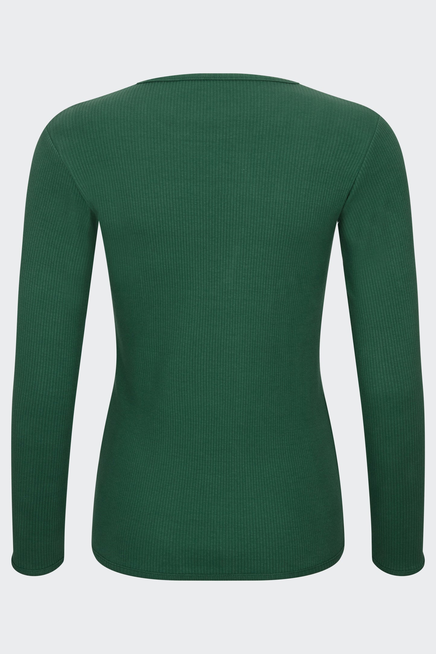 Stylish family in matching forest green pyjamas from DreamBuy, showcasing a trendy and minimalist design perfect for festive occasions.