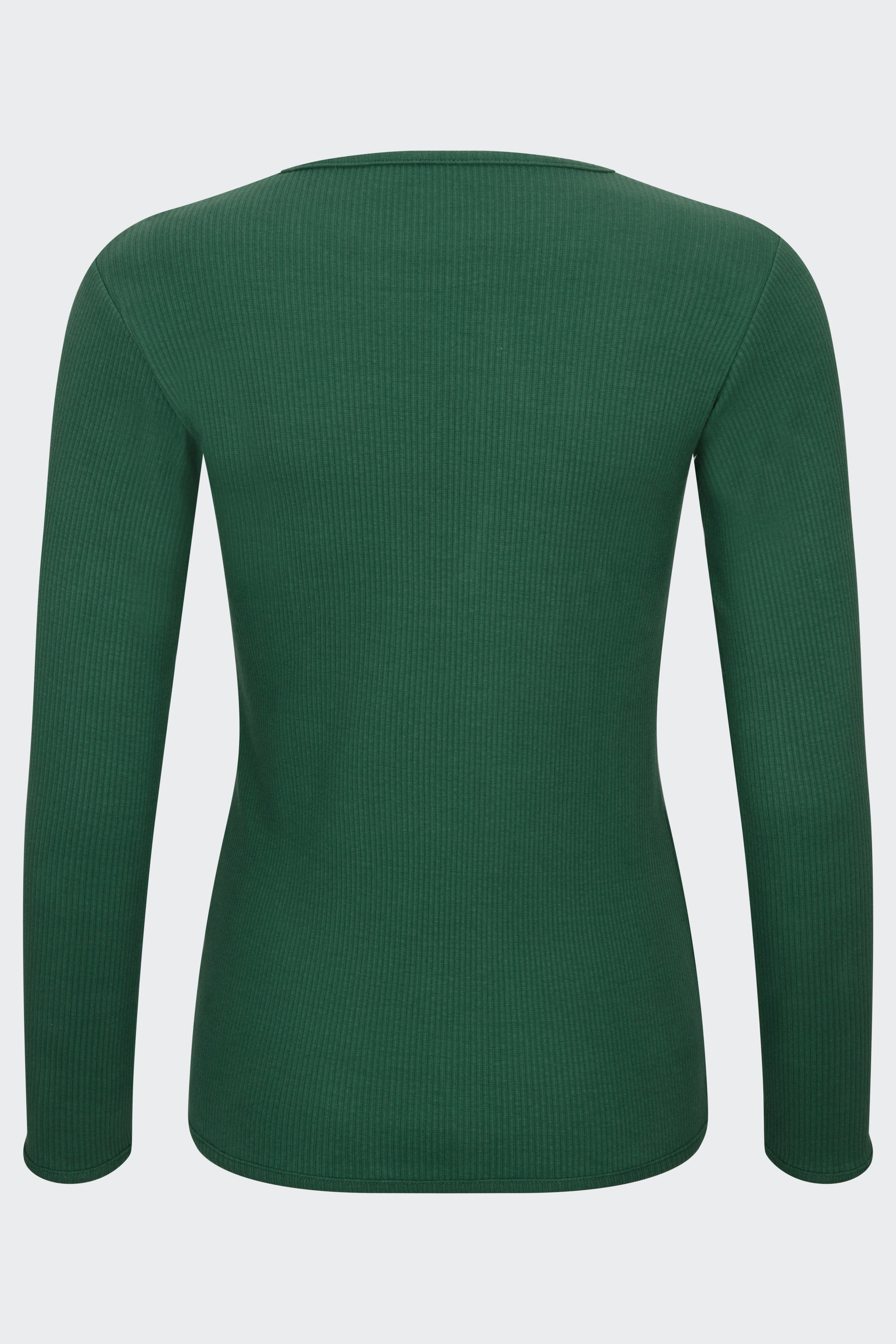 Stylish family in matching forest green pyjamas from DreamBuy, showcasing a trendy and minimalist design perfect for festive occasions.