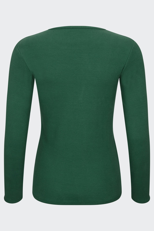 Stylish family in matching forest green pyjamas from DreamBuy, showcasing a trendy and minimalist design perfect for festive occasions.