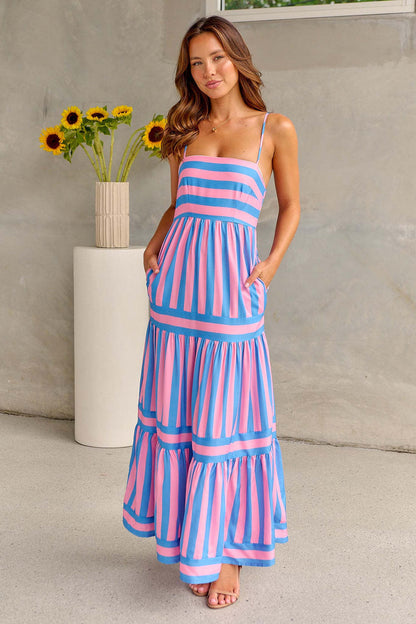 Summer Striped Printed Suspender Long Dress With Pockets in striking pink and blue stripes, designed for fashionable beach vacations, exuding a sense of luxury and style.