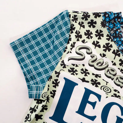 Back view of the Sweet Legend Women's Vibrant Print Cropped Tee by Dazzling Dreams Studio, highlighting the luxury fabric and artistic design.