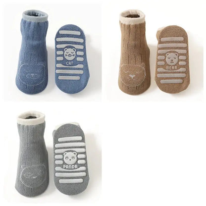 Charming Women's Girls Non Slip Safety Winter warmer Grippy Socks in blue and brown, showcasing cute animal faces, ideal for adding warmth and style to your winter wardrobe.