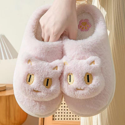 Cotton Cat Slippers Soft Plush Comfy Warm Couple Slip-On House adorned with a cute pink cat face, offering a cozy and chic winter footwear option.