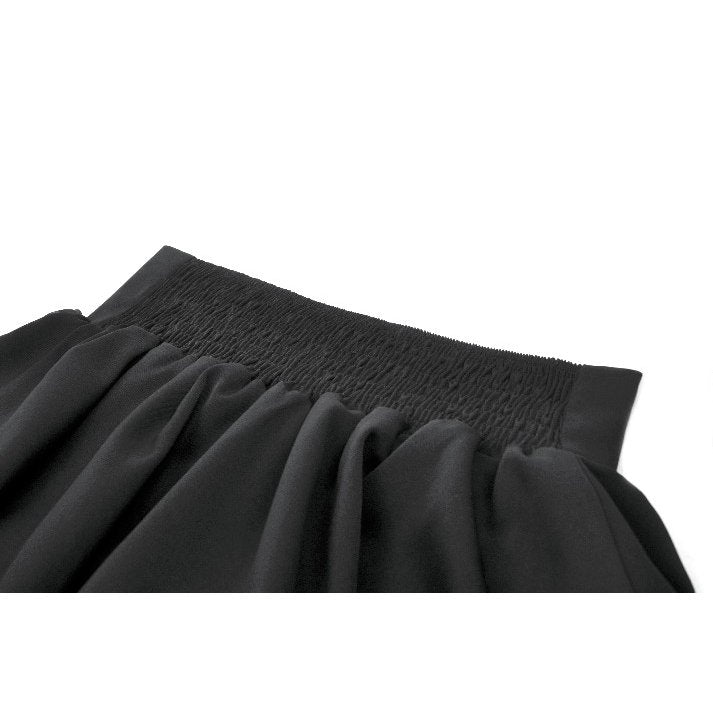 The Dark in Love black Lolita-inspired high-waisted skirt displayed against an elegant backdrop, highlighting its chic design and versatility for various outfits.