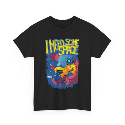 Stylish black t-shirt adorned with a vibrant graphic of an astronaut relaxing, accentuated by playful cosmic elements and the phrase 'I NEED SOME SPACE' in bold lettering.