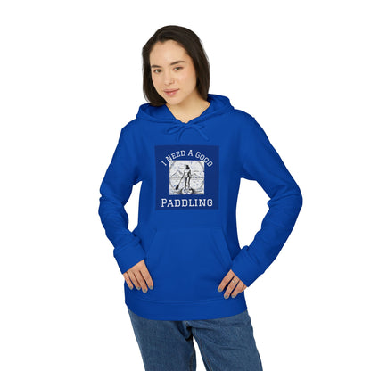 Model wearing Adidas Women´s Fleece 'I Need a Good Paddling' Hoodie in blue, emphasising comfort and style for paddleboard enthusiasts.