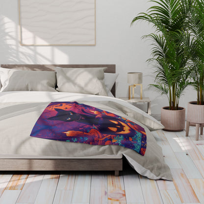 Luxurious Decorative and Warm Halloween Spooky Arctic Fleece Blanket elegantly draped on a bed, featuring a vibrant design with a black cat and pumpkins, perfect for adding a festive touch to your Halloween decor.