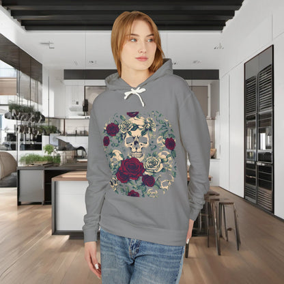 Model wearing a stylish Unisex Lightweight Hooded Sweatshirt with a unique designer skull and roses design, elegantly presented in a modern kitchen setting.