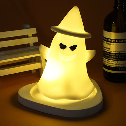 Halloween LED Glowing Cute Small Night Lamp designed as a whimsical ghost, emanating a gentle light, ideal for sophisticated Halloween celebrations.