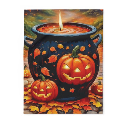 Luxurious Decorative and Warm Halloween Spooky Arctic Fleece Blanket featuring festive pumpkins and a cauldron surrounded by autumn leaves.