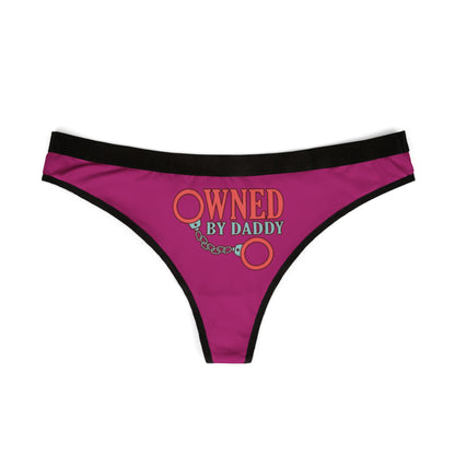 Elegant women's thong featuring a bold 'Owned By Daddy' text with handcuff graphic, designed in rich pink fabric, ideal for playful intimacy and special celebrations.