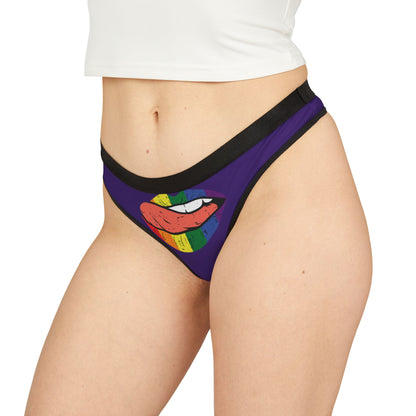 Stylishly cut women's thong adorned with a vivid rainbow lips graphic, set against a sophisticated purple hue for a cheeky yet luxurious feel.