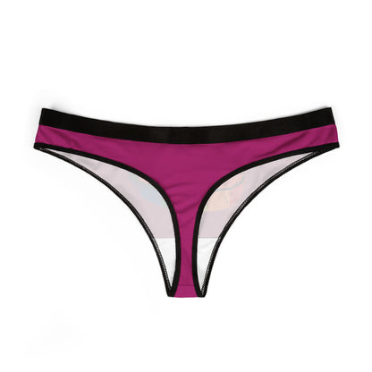 Elegant women's thong showcasing a playful pink design, perfect for adding a cheeky touch to intimate wear.
