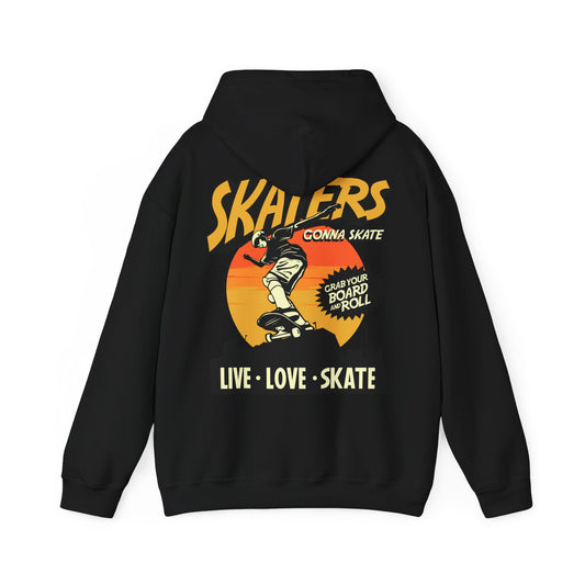 Elegant black hoodie showcasing an eye-catching graphic of a skateboarder in dynamic motion, adorned with the empowering phrase 'SKATERS GONNA SKATE' in golden tones against a stunning sunset background.