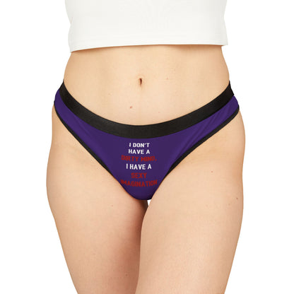 Luxurious women's thong featuring playful text, 'I don't have a dirty mind, I have a sexy imagination', designed for cheeky romantic occasions. Perfect for adding a touch of elegance and humour to intimate moments.