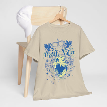 Death Valley T-Shirt artistically arranged with a white cap on a chair, showcasing a unique skull graphic and crown, perfect for chic, everyday elegance.