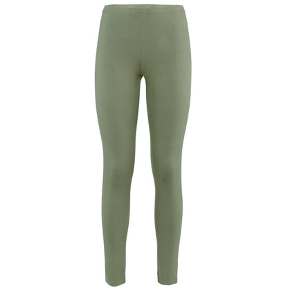 Lifestyle image of a woman wearing high-rise organic cotton leggings, embodying elegance and comfort in a relaxed setting.