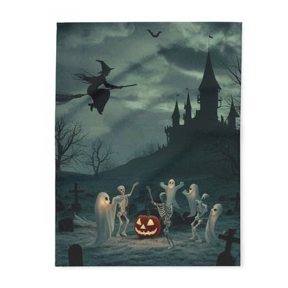 Luxurious decorative and warm Halloween spooky Arctic fleece blanket featuring a dark, enchanting scene with ghosts, skeletons, and a witch flying over a haunted castle, perfect for adding a festive charm to your autumn décor.