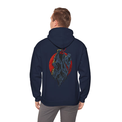 Man showcasing a navy hoodie with striking demon artwork on the back, embodying a blend of style and fierce individuality.
