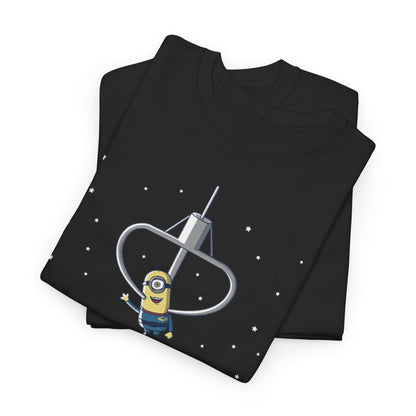 The minion's The Claw is My Master Unisex Men’s Women’s Graphic T Shirt Tee featuring a single Minion joyfully interacting with a claw machine, perfect for fans of fun and nostalgia. T Shirt, Funny, Minions.