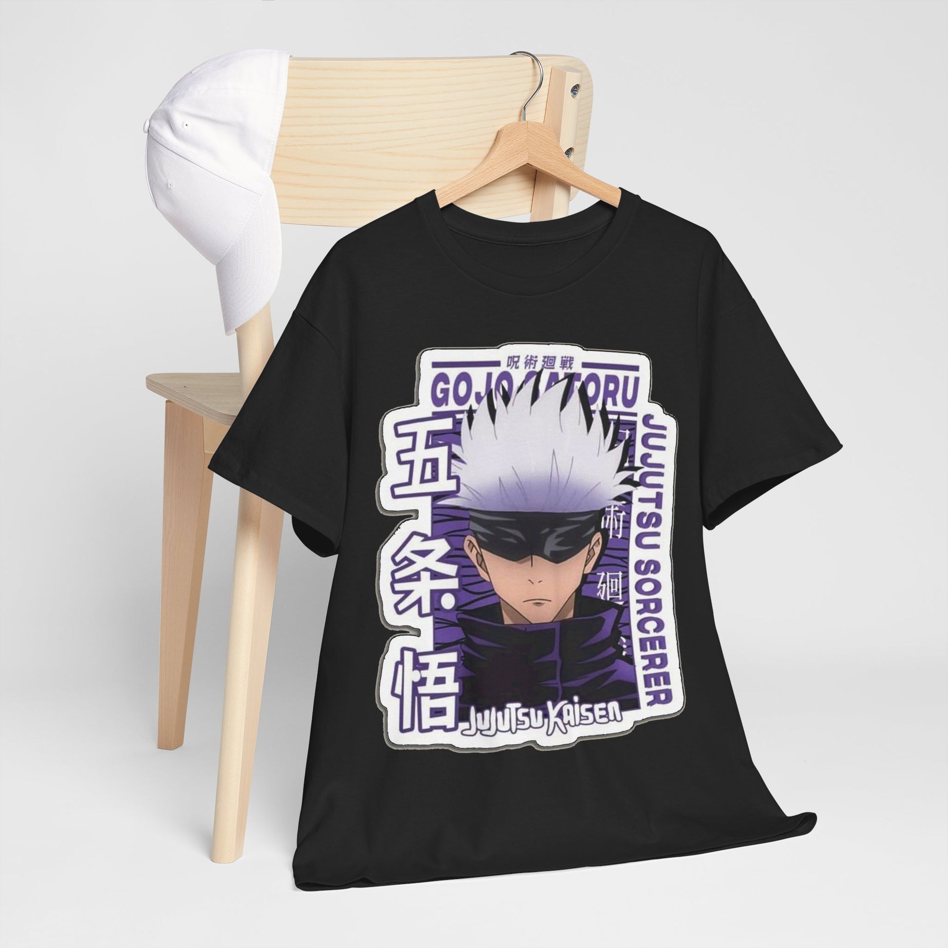 Sophisticated Gojo Satoru T-shirt perched on a chic wooden chair, displaying captivating artwork from *Jujutsu Kaisen*, ideal for adding a touch of luxury to any casual outfit.