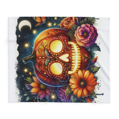 Luxurious Decorative and Warm Halloween Skellington Spooky Arctic Fleece Blanket featuring a vibrant skull pumpkin design embellished with flowers against a starry night sky.