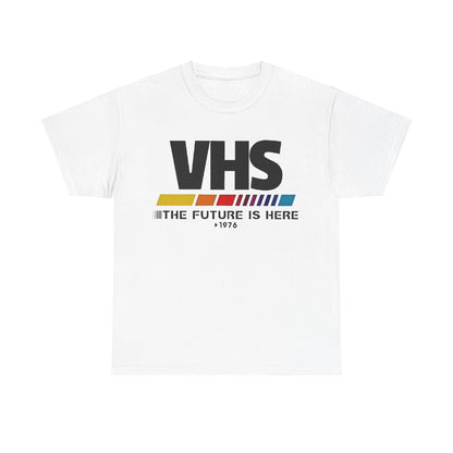VHS Retro Logo Graphic Tee for Unisex in pristine white featuring a nostalgic design with bold lettering that reads 'THE FUTURE IS HERE 1976', crafted from soft cotton for ultimate comfort.