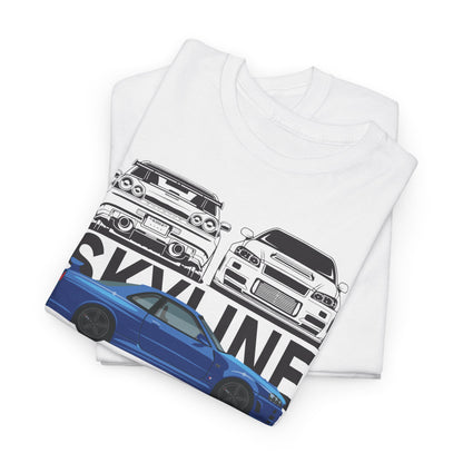 Folded white Nissan Skyline GT-R T-Shirt displaying vibrant blue and monochrome imagery of classic Skyline models, ideal for stylish automotive aficionados.
