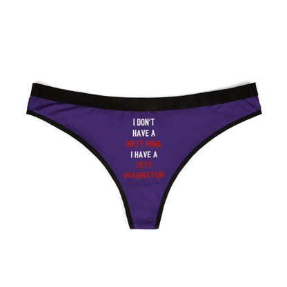 Luxurious women's thong featuring humorous text 'I DON'T HAVE A DIRTY MIND, I HAVE A SEXY IMAGINATION' in bold typography, set against an elegant purple background.