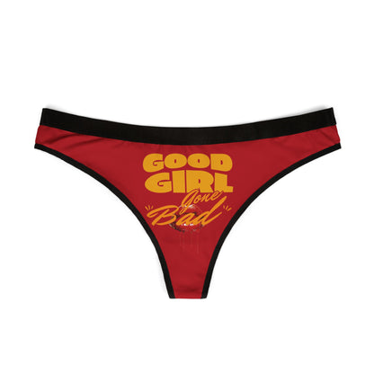 Exquisite red thong featuring a striking graphic of 'Good Girl Gone Bad' in stylish lettering, designed for the modern, confident woman.