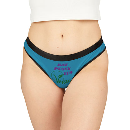 Close-up of stylish women's thong underwear featuring a fun vegan phrase, combining humour with a chic and comfortable fit.
