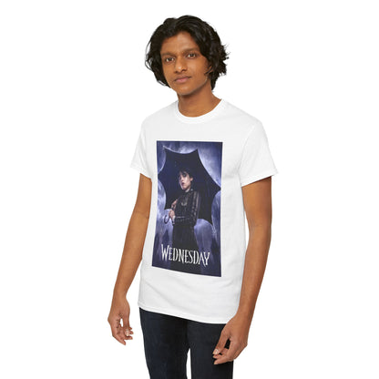 Model wearing a luxury unisex graphic tee with 'Wednesday' Embrace the Dark Elegance design, featuring an illustrative motif of Wednesday Addams amid a dark, moody atmosphere.