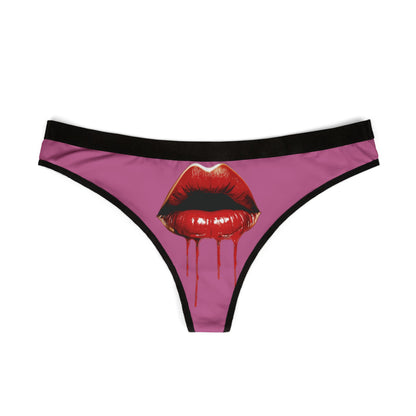 Elegant Cheeky Women's Thong displaying a striking design of red lips with a dripping effect on a soft pink background, perfect for adding whimsy to intimate apparel.